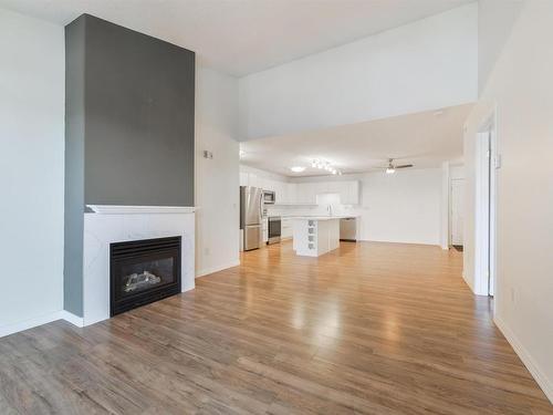 417 8912 156 Street, Edmonton, AB - Indoor Photo Showing Living Room With Fireplace