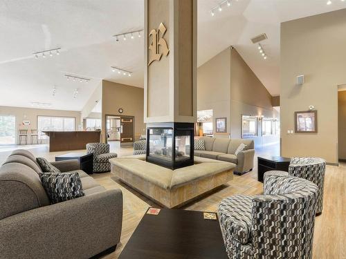 417 8912 156 Street, Edmonton, AB - Indoor Photo Showing Living Room With Fireplace