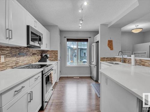 91 3305 Orchards Link Link, Edmonton, AB - Indoor Photo Showing Kitchen With Stainless Steel Kitchen With Double Sink With Upgraded Kitchen