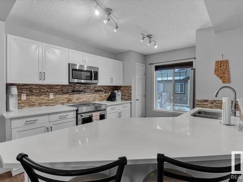 91 3305 Orchards Link Link, Edmonton, AB - Indoor Photo Showing Kitchen With Double Sink With Upgraded Kitchen