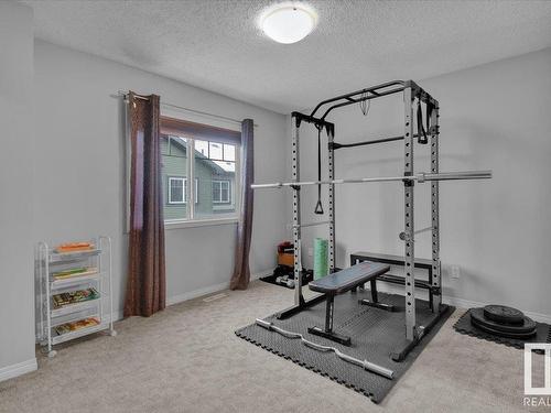 91 3305 Orchards Link Link, Edmonton, AB - Indoor Photo Showing Gym Room