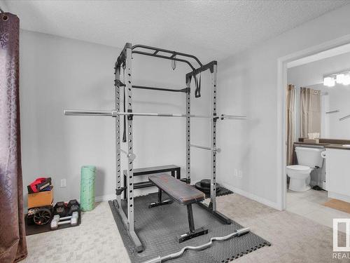 91 3305 Orchards Link Link, Edmonton, AB - Indoor Photo Showing Gym Room