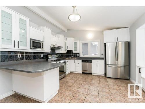 8711 25A Avenue, Edmonton, AB - Indoor Photo Showing Kitchen With Stainless Steel Kitchen