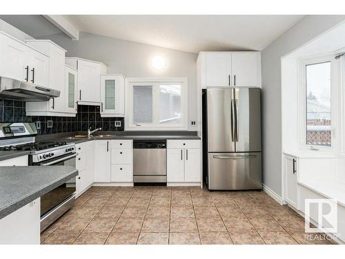 8711 25A Avenue, Edmonton, AB - Indoor Photo Showing Kitchen With Stainless Steel Kitchen