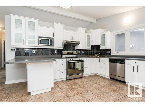 8711 25A Avenue, Edmonton, AB - Indoor Photo Showing Kitchen With Stainless Steel Kitchen