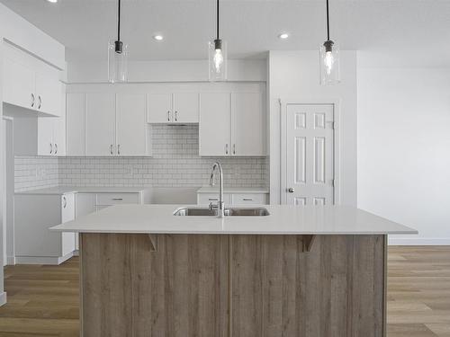 4668 177 Avenue, Edmonton, AB - Indoor Photo Showing Kitchen With Double Sink With Upgraded Kitchen