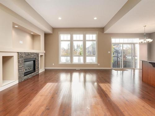 633 Cantor Landing, Edmonton, AB - Indoor Photo Showing Living Room With Fireplace