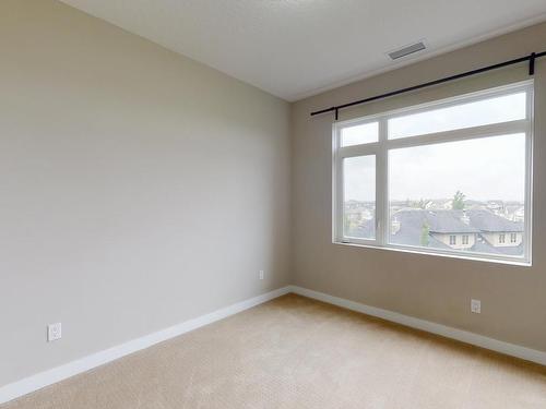 405 5151 Windermere Boulevard Sw, Edmonton, AB - Indoor Photo Showing Other Room