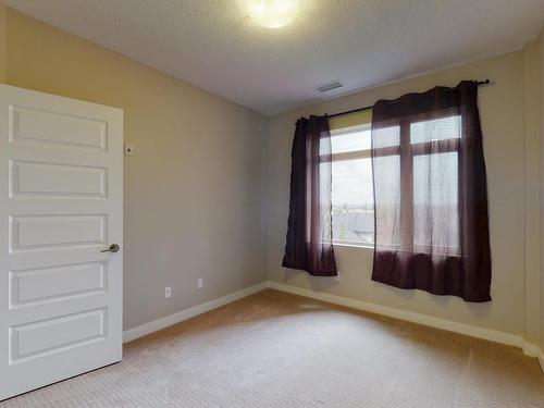 405 5151 Windermere Boulevard Sw, Edmonton, AB - Indoor Photo Showing Other Room