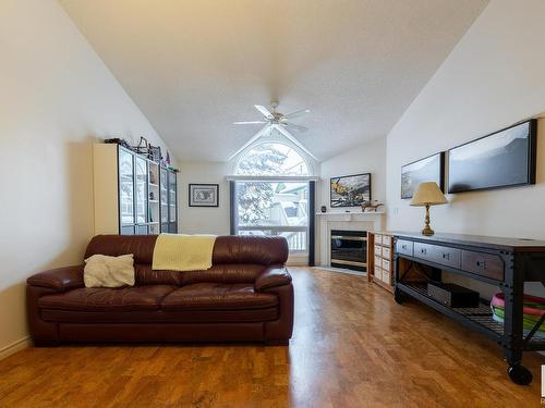 34 20 Ironwood Point(E), St. Albert, AB - Indoor Photo Showing Living Room With Fireplace