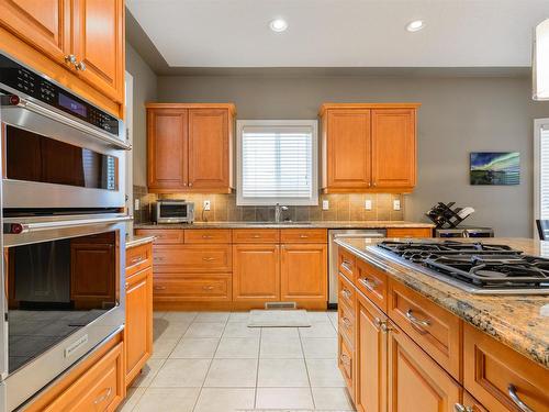 57 1225 Wanyandi Road, Edmonton, AB - Indoor Photo Showing Kitchen