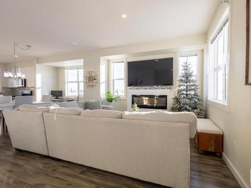 2208 8530 94 Street, Fort Saskatchewan, AB - Indoor Photo Showing Living Room With Fireplace