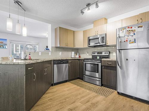 322 42 Ave Nw, Edmonton, AB - Indoor Photo Showing Kitchen With Stainless Steel Kitchen With Upgraded Kitchen