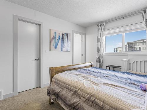 322 42 Ave Nw, Edmonton, AB - Indoor Photo Showing Bedroom