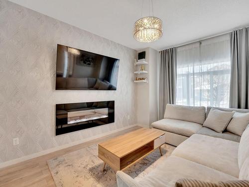 7314 Armour Crescent, Edmonton, AB - Indoor Photo Showing Living Room With Fireplace