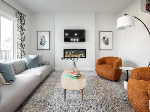 4811 Hawthorn Bend Bend, Edmonton, AB - Indoor Photo Showing Living Room With Fireplace