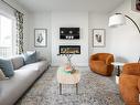 4811 Hawthorn Bend Bend, Edmonton, AB  - Indoor Photo Showing Living Room With Fireplace 