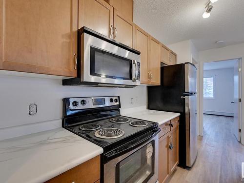 218 1180 Hyndman Road, Edmonton, AB - Indoor Photo Showing Kitchen