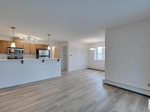 218 1180 Hyndman Road, Edmonton, AB - Indoor Photo Showing Kitchen