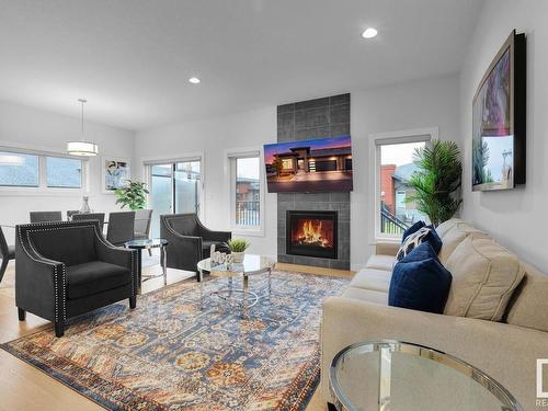 39 4517 190A Street, Edmonton, AB - Indoor Photo Showing Living Room With Fireplace