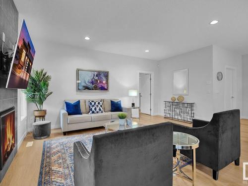 39 4517 190A Street, Edmonton, AB - Indoor Photo Showing Living Room With Fireplace