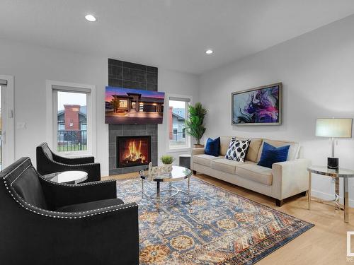 39 4517 190A Street, Edmonton, AB - Indoor Photo Showing Living Room With Fireplace