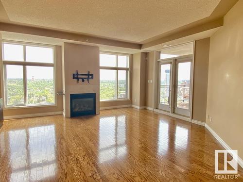 1506 9020 Jasper Avenue, Edmonton, AB - Indoor With Fireplace