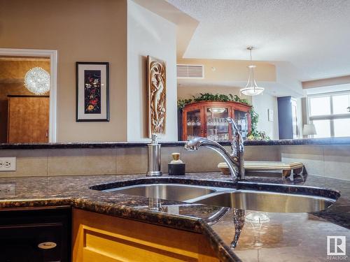 1506 9020 Jasper Avenue, Edmonton, AB - Indoor Photo Showing Kitchen With Double Sink