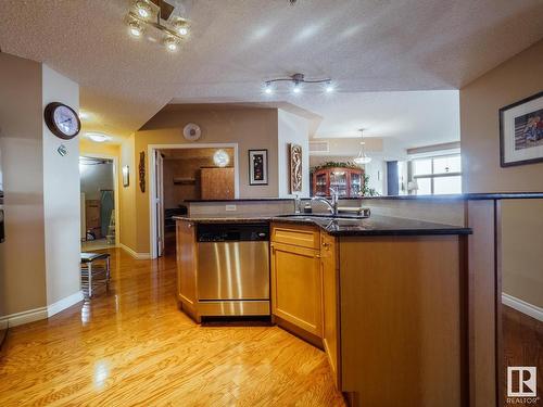 1506 9020 Jasper Avenue, Edmonton, AB - Indoor Photo Showing Kitchen With Double Sink