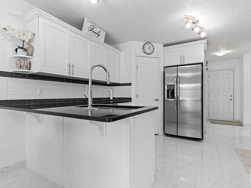 1947 51 Street, Edmonton, AB - Indoor Photo Showing Kitchen With Upgraded Kitchen