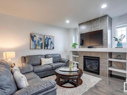 3021 Carpenter Landing, Edmonton, AB - Indoor Photo Showing Living Room With Fireplace