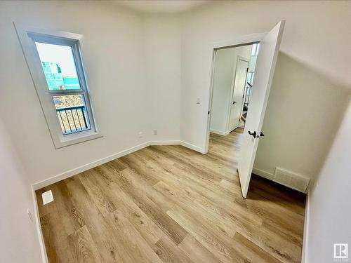 1918 155 Avenue, Edmonton, AB - Indoor Photo Showing Other Room With Fireplace