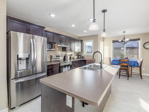 2159 Trumpeter Way, Edmonton, AB - Indoor Photo Showing Kitchen With Stainless Steel Kitchen With Double Sink