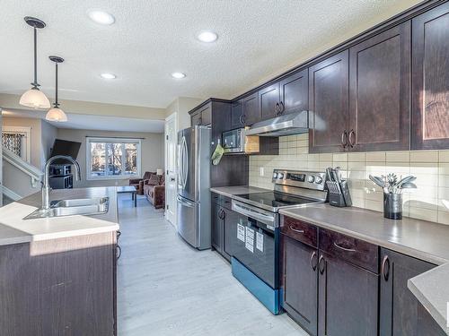 2159 Trumpeter Way, Edmonton, AB - Indoor Photo Showing Kitchen With Stainless Steel Kitchen With Double Sink