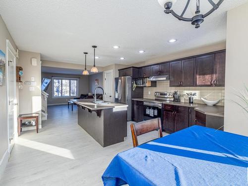 2159 Trumpeter Way, Edmonton, AB - Indoor Photo Showing Kitchen With Stainless Steel Kitchen