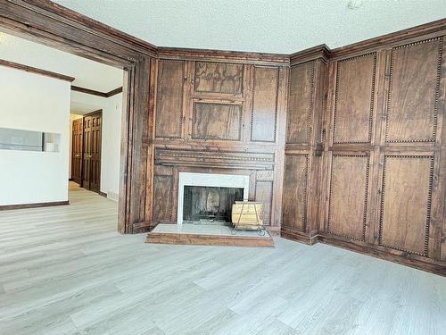 301 Lancaster Terrace, Edmonton, AB - Indoor Photo Showing Living Room With Fireplace