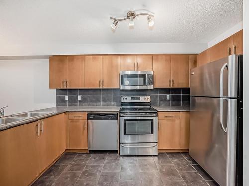 405 10118 106 Avenue, Edmonton, AB - Indoor Photo Showing Kitchen With Double Sink