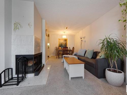 78 2703 79 Street, Edmonton, AB - Indoor Photo Showing Living Room With Fireplace