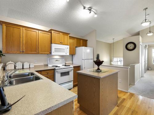 14012 152 Avenue Nw, Edmonton, AB - Indoor Photo Showing Kitchen With Double Sink