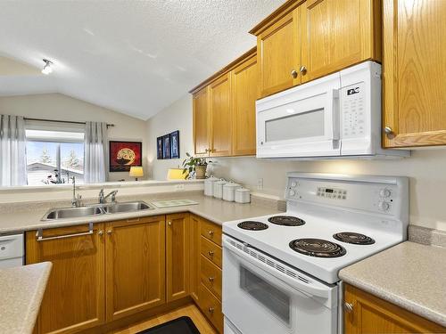 14012 152 Avenue Nw, Edmonton, AB - Indoor Photo Showing Kitchen With Double Sink