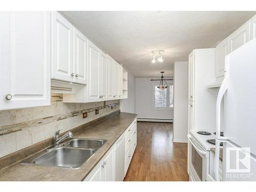 303 9737 112 Street, Edmonton, AB - Indoor Photo Showing Kitchen With Double Sink