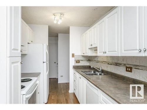 303 9737 112 Street, Edmonton, AB - Indoor Photo Showing Kitchen With Double Sink