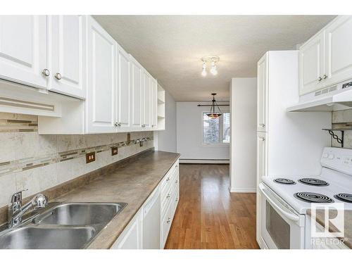 303 9737 112 Street, Edmonton, AB - Indoor Photo Showing Kitchen With Double Sink