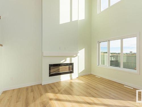 3619 41 Avenue, Beaumont, AB - Indoor Photo Showing Living Room With Fireplace