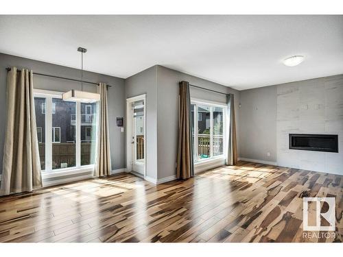 3159 Winspear Crescent, Edmonton, AB - Indoor Photo Showing Living Room With Fireplace