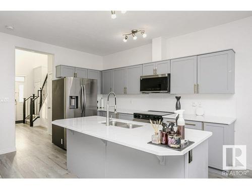 41 18230 104A Street, Edmonton, AB - Indoor Photo Showing Kitchen With Double Sink