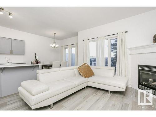 41 18230 104A Street, Edmonton, AB - Indoor Photo Showing Living Room With Fireplace