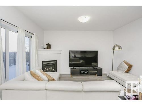 41 18230 104A Street, Edmonton, AB - Indoor Photo Showing Living Room With Fireplace