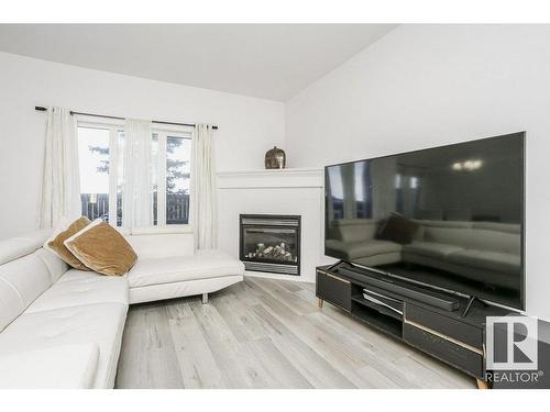 41 18230 104A Street, Edmonton, AB - Indoor Photo Showing Living Room With Fireplace