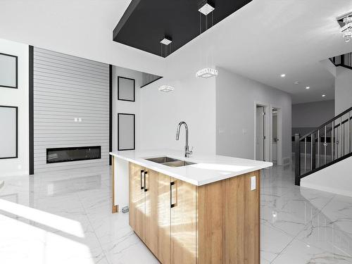 1415 11 Avenue, Edmonton, AB - Indoor Photo Showing Kitchen With Double Sink